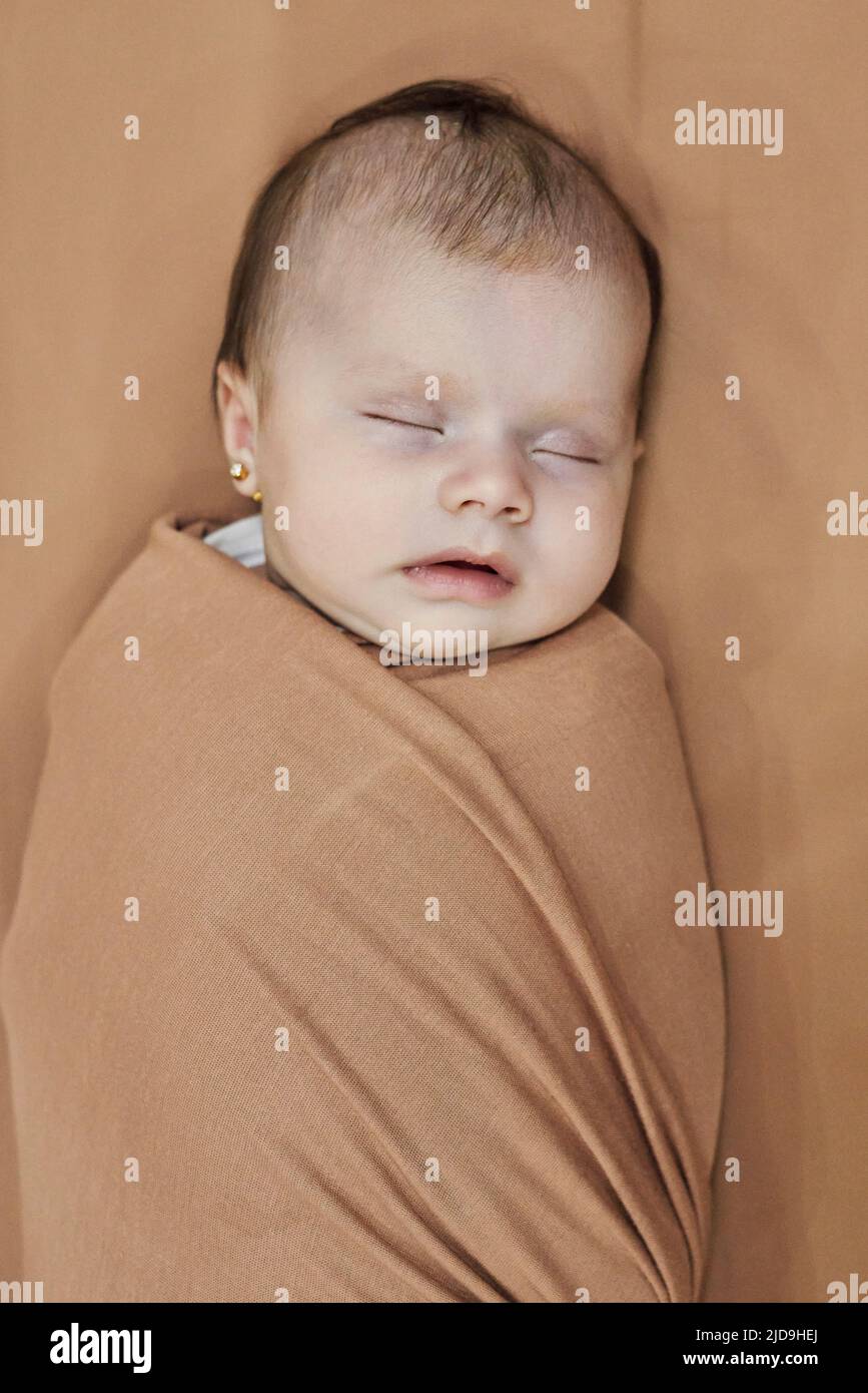Newborn baby girl, sleeping on a blanket Stock Photo Alamy