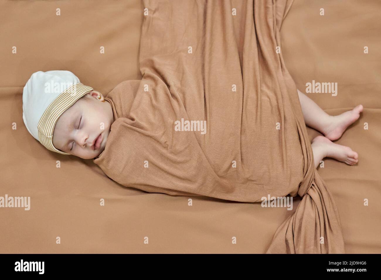 Newborn baby girl sleeping on a blanket Stock Photo Alamy