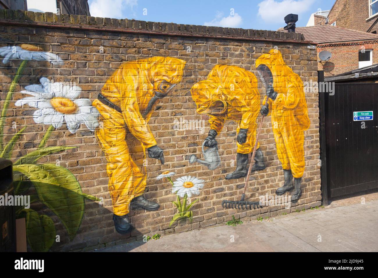 Street art, Penge, South-east London, UK. Illustrating hazardous conservation work! Stock Photo