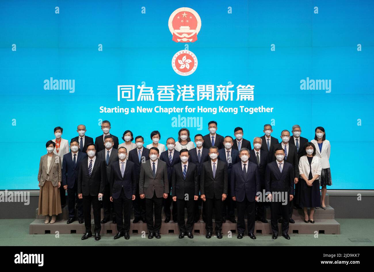 Hong Kong, June 19. 1st July, 2022. John Lee, the incoming chief executive of the Hong Kong Special Administrative Region (HKSAR), and principal officials of the sixth-term HKSAR government, pose for a group photo during a press conference in South China's Hong Kong, June 19, 2022. China's State Council on Sunday appointed principal officials of the sixth-term government of the HKSAR based on the nominations put forward by the incoming HKSAR chief executive John Lee. The officials will assume office on July 1, 2022. Credit: Lui Siu Wai/Xinhua/Alamy Live News Stock Photo