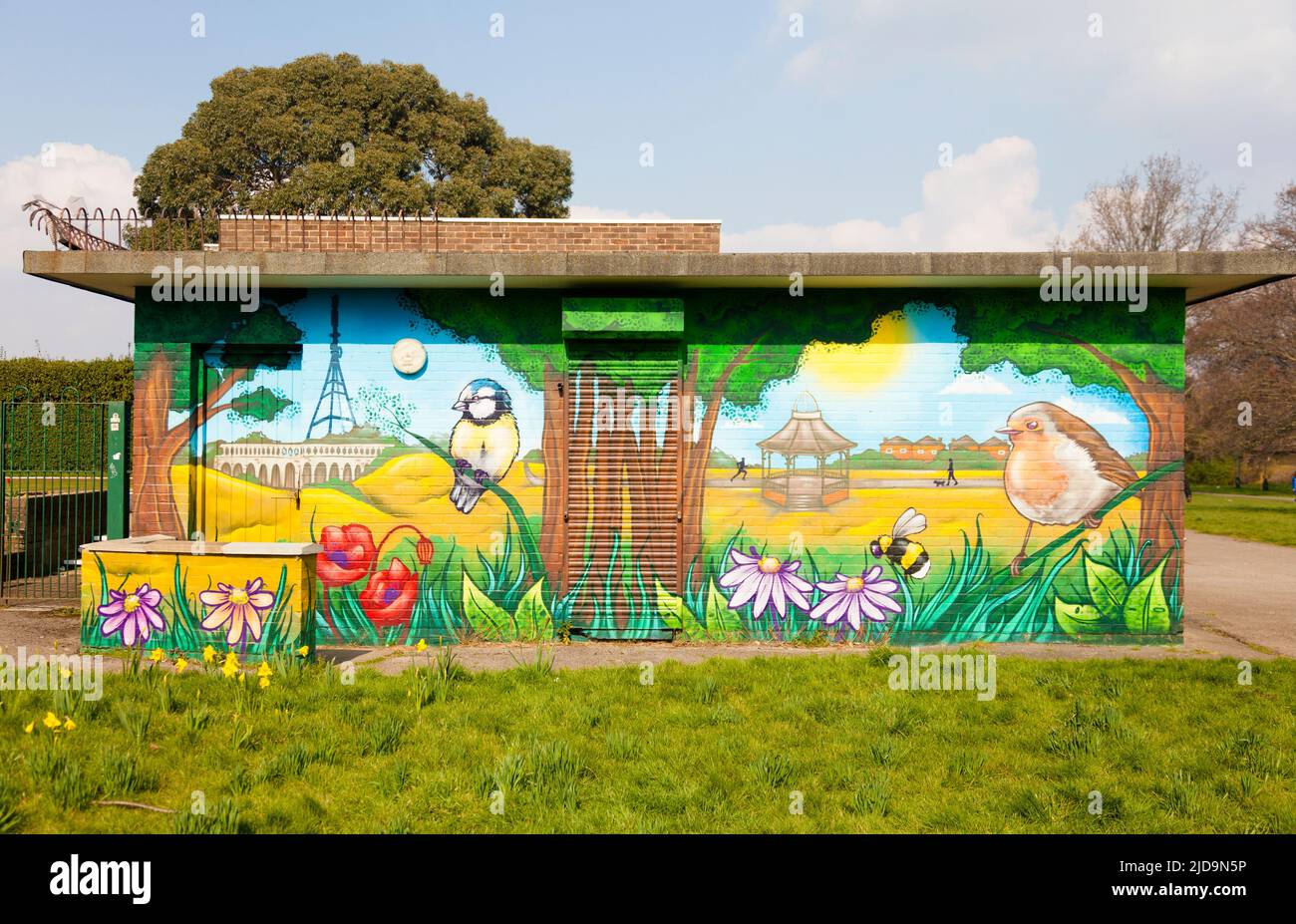 Street art on wall of football changing rooms in park, Penge, SE London, UK. Stock Photo