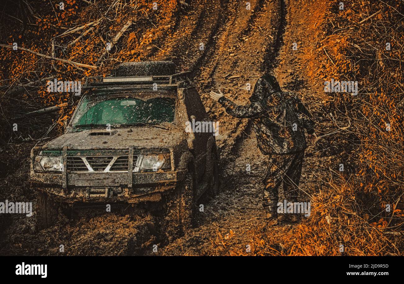 Offroad vehicle goes on mountain way. Motion the wheels tires and off