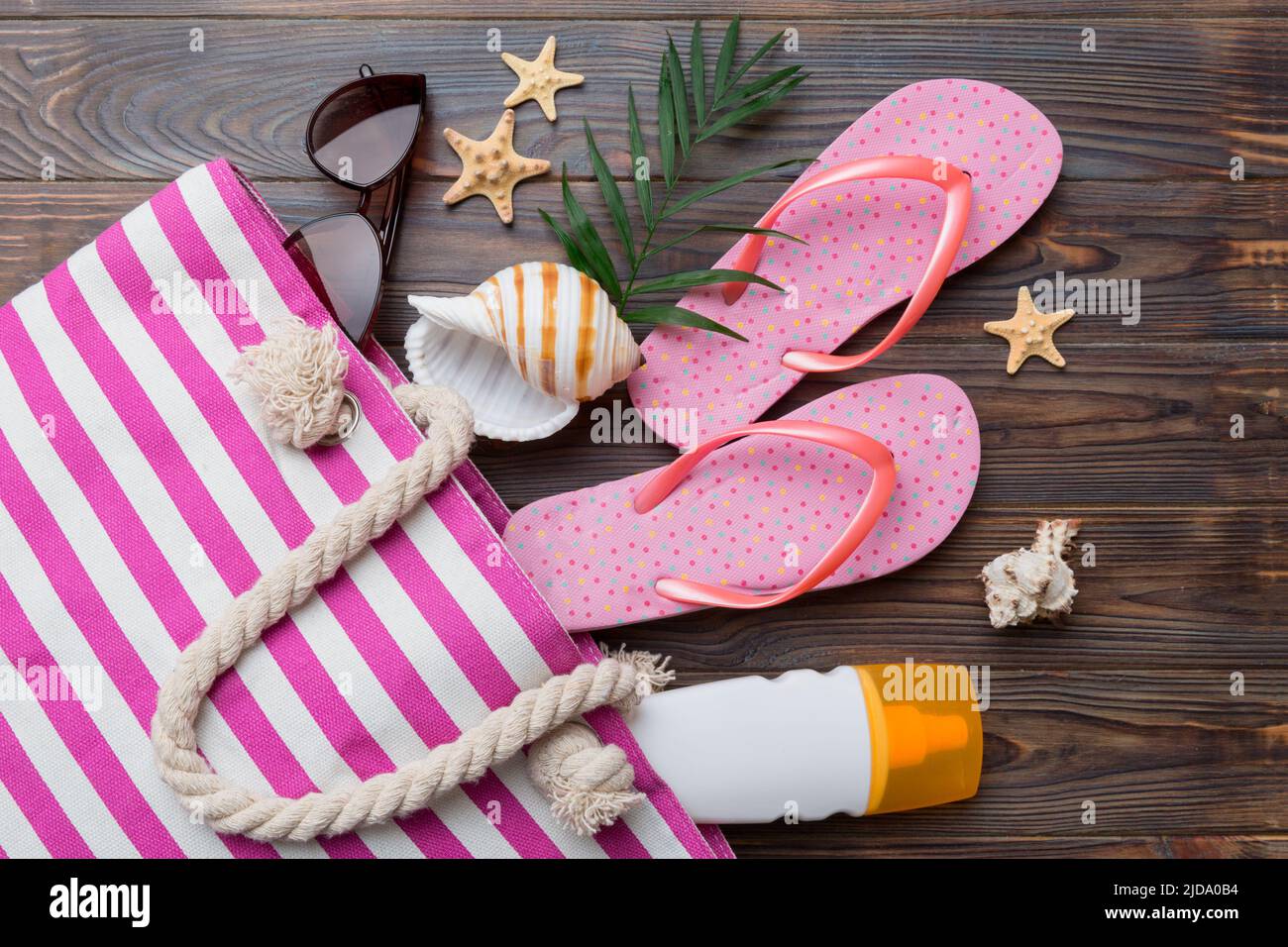 beach accessories flat lay top view on colored background Summer travel ...