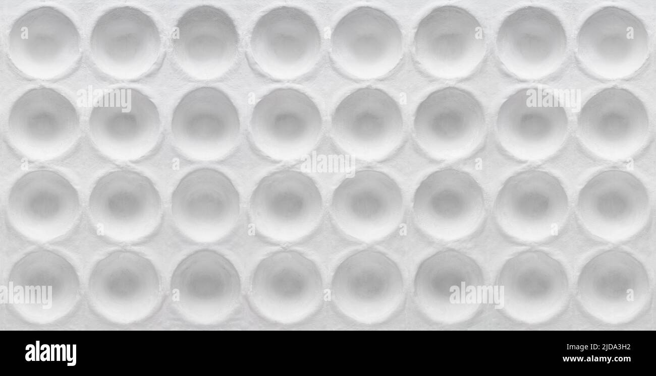 White round textured cardboard. (selective focus )Round geometric pits on cardboard Stock Photo