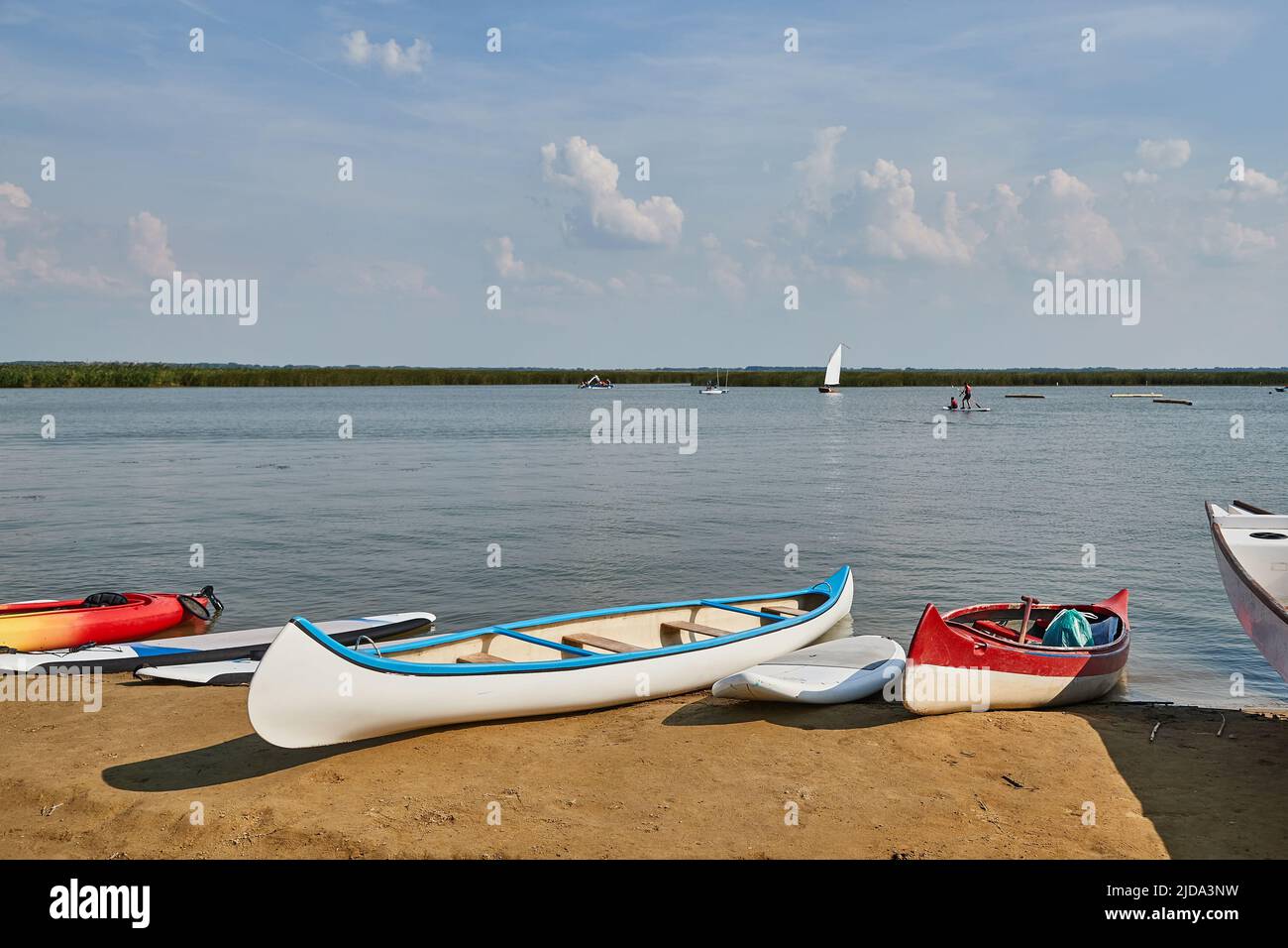Canoes ans SUPs on the Lakeside Stock Photo
