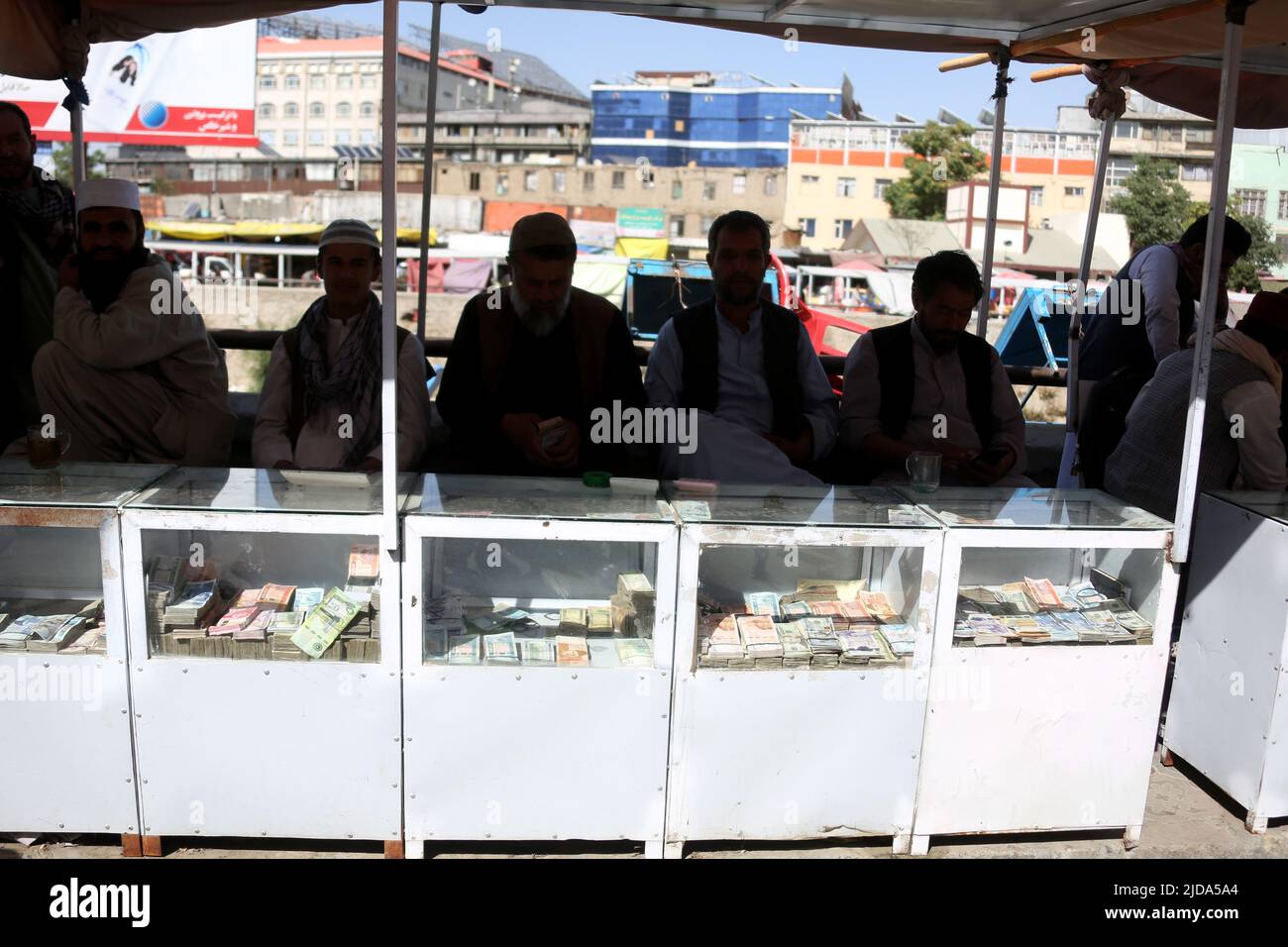 Kabul, Afghanistan. 19th June, 2022. Afghan dealers wait for customers