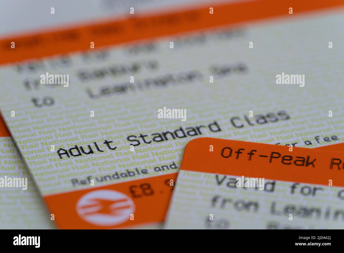 Closeup on UK Adult Standard Class Rail tickets. Theme - railway fare increases, rail ticket offices, English train tickets, travel price increases Stock Photo