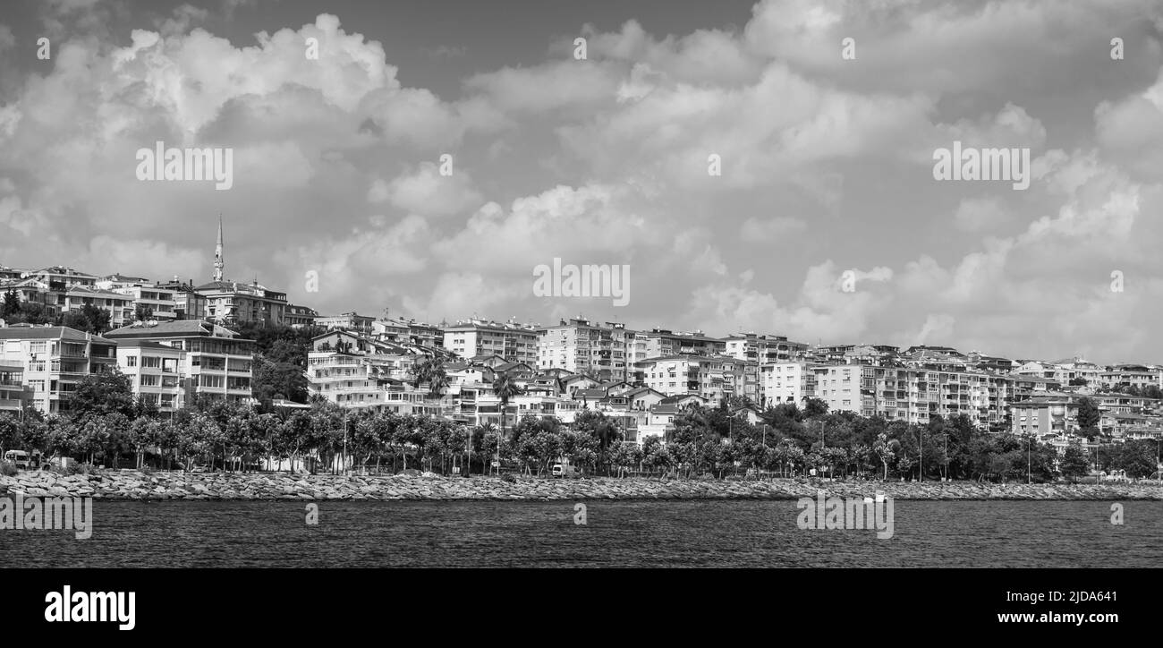 Coastal landscape of Avcilar district of Istanbul, Turkey. Panoramic black and white photo Stock Photo