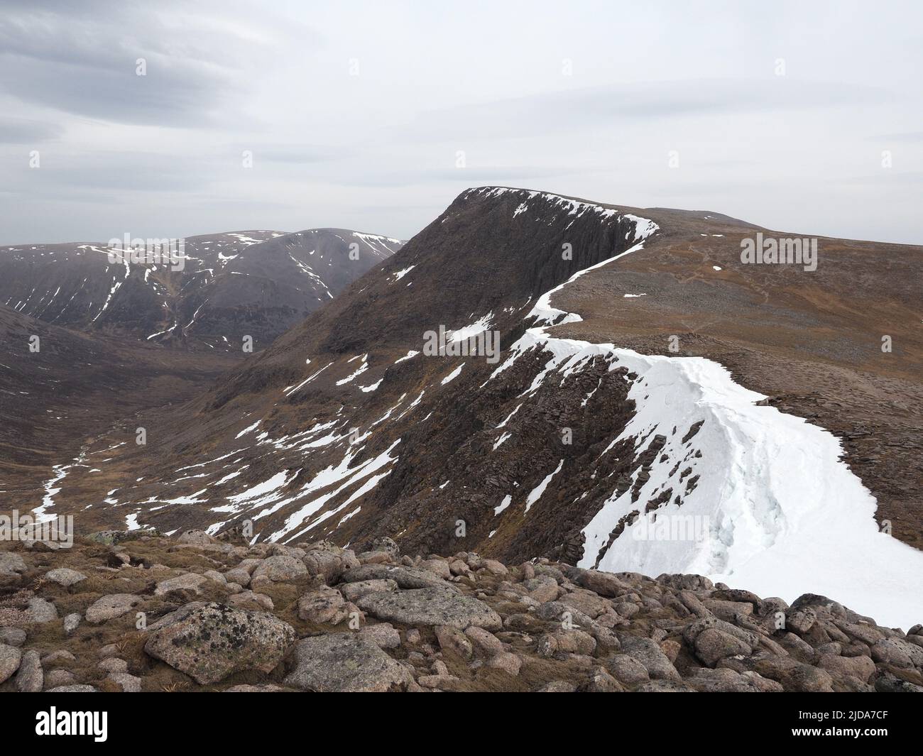 Looking down An Garbh Coire, across the Lairig Ghru with Ben Macdui in the background. The Angels Peak, Sgor an Lochain Uaine in the middle right. Stock Photo