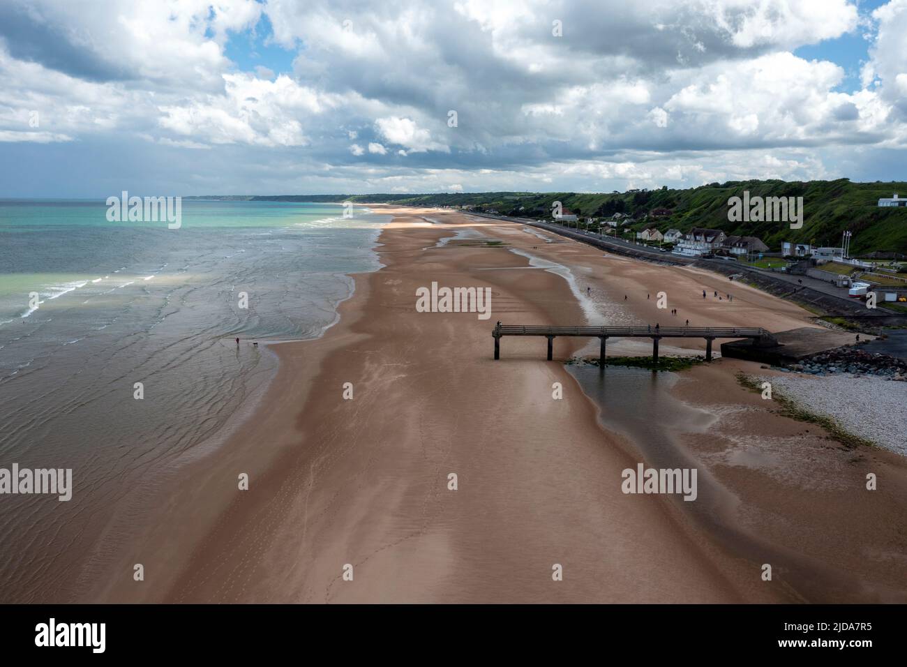 Aerial view of sightseeing tourists on the Pier at Omaha Beach, Vierville-sur-Mer, Calvados, Normandy, France. Stock Photo