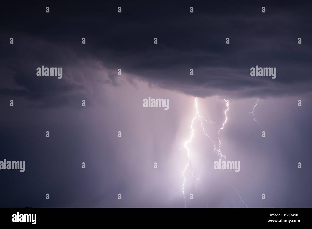 Stormy sky with lightning strikes and thunderstorm clouds Stock Photo ...