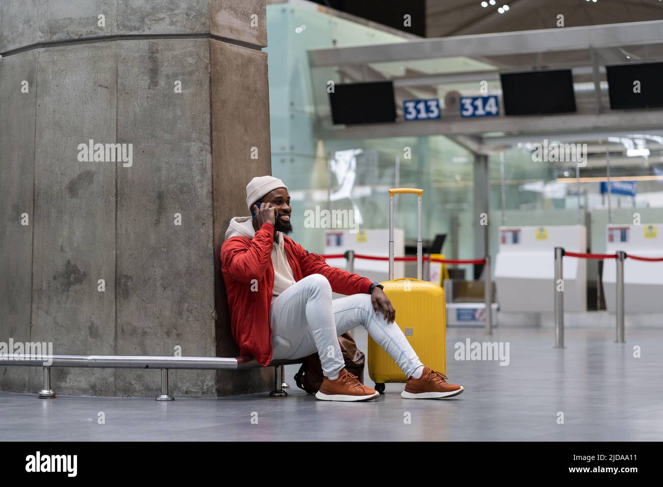 Person wearing red jacket hi-res stock photography and images - Alamy
