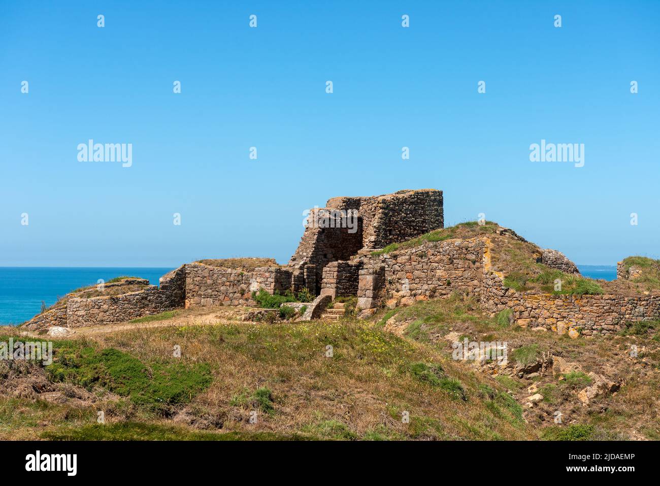 Fliquet Castle in Fliquet Bay, Jersey Stock Photo - Alamy