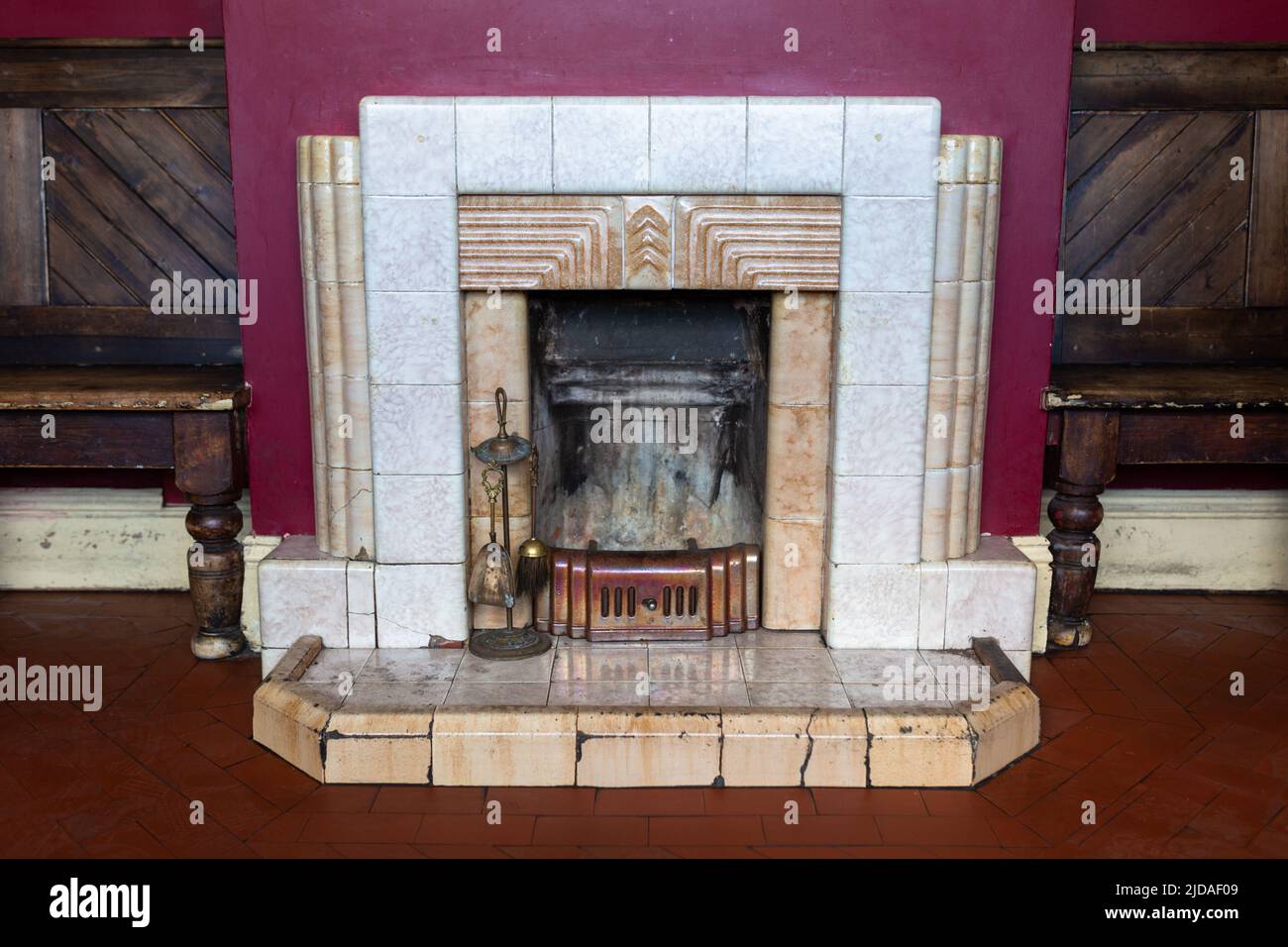 1920s tiled fire surround and fireplace, UK 2022 Stock Photo