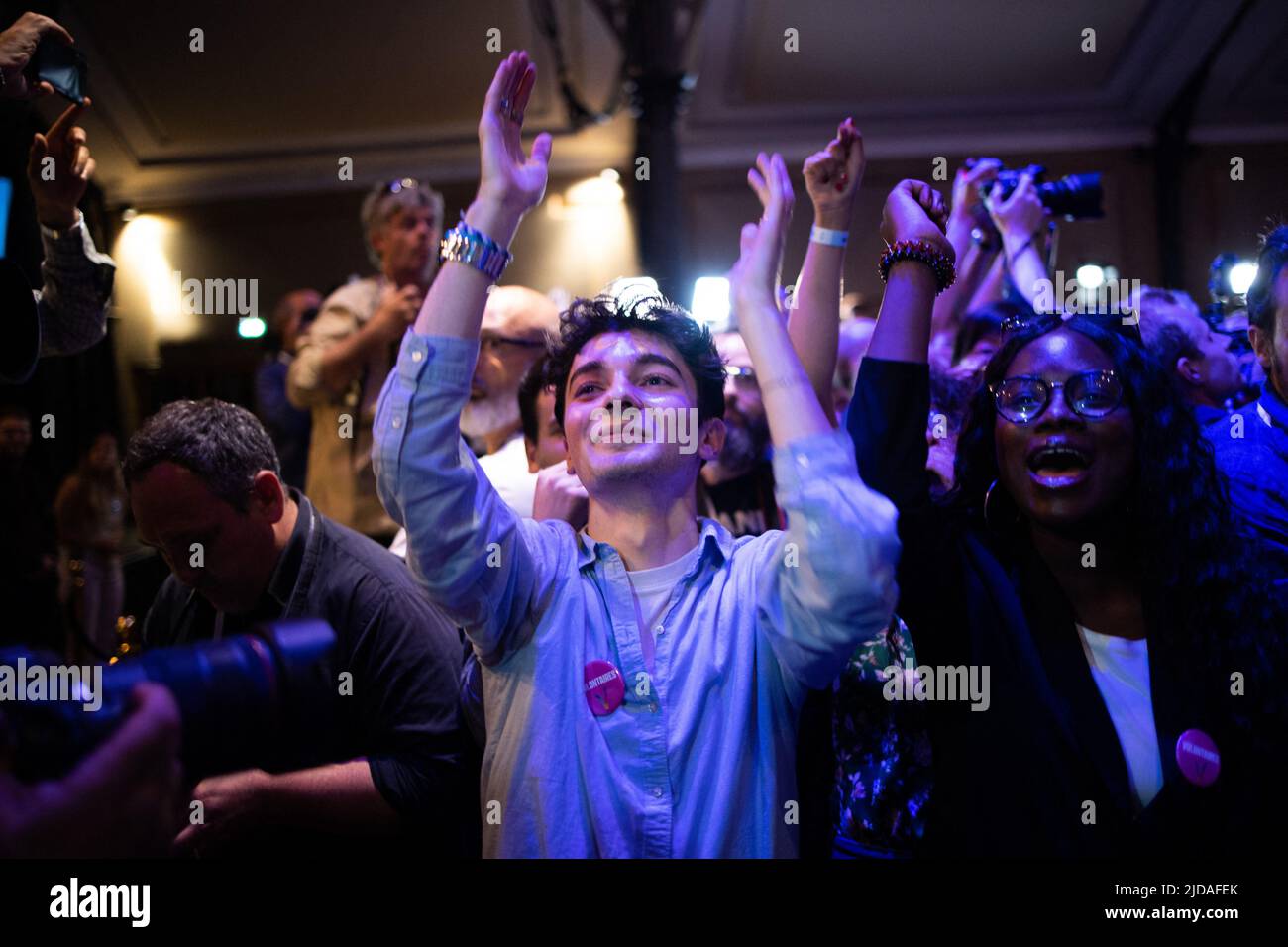 Supporters of left-wing coalition NUPES react after the first results of the parliamentary elections in Paris, on June 19, 2022. The vote is decisive for the French president second-term agenda following his re-election in April, with the 44-year-old needing a majority in order to push through promised tax cuts and welfare reform and raise the retirement age. Photo by Raphael Lafargue/ABACAPRESS.COM Stock Photo