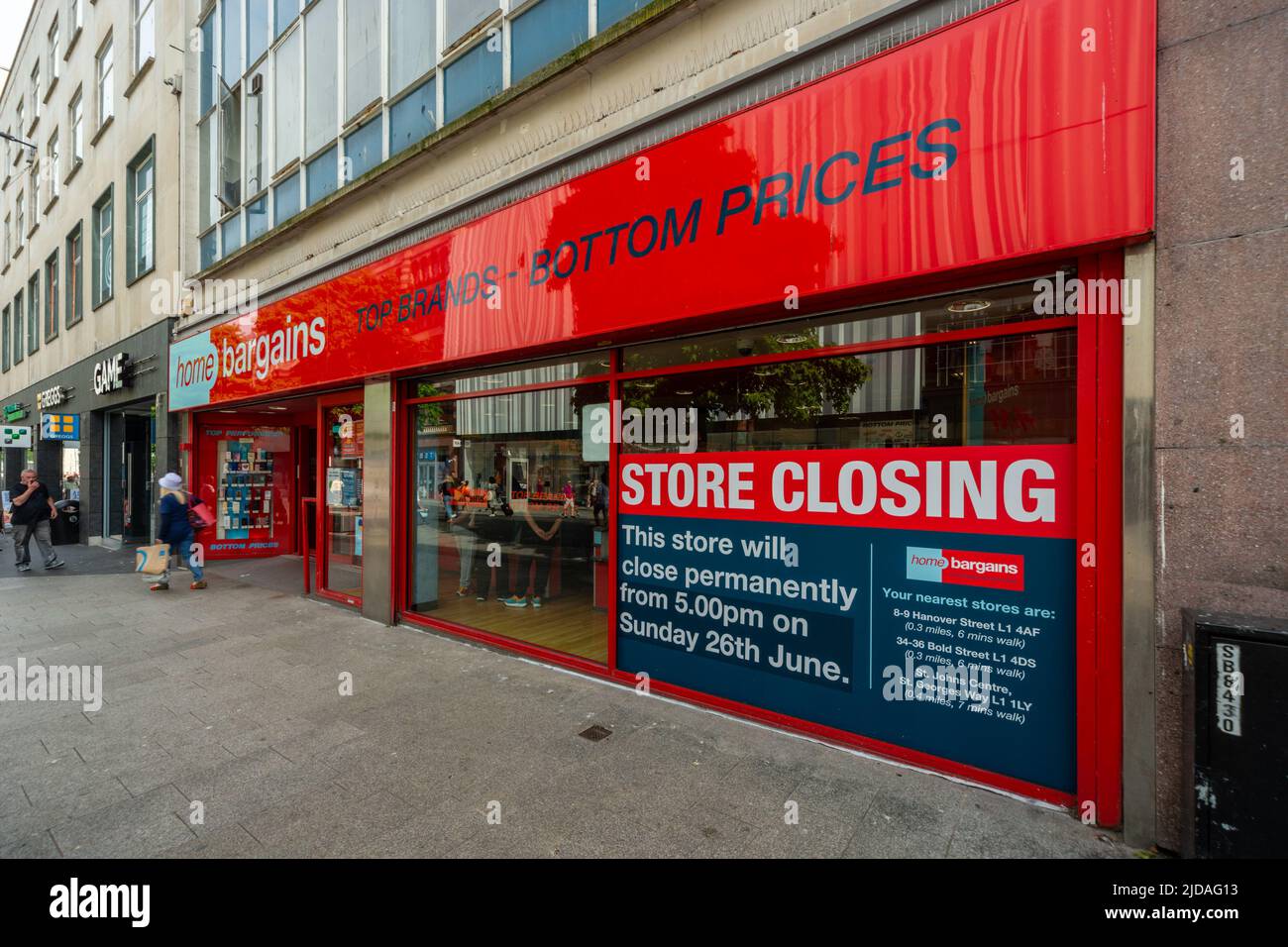 Home Bargains store, Lord Street, Liverpool, England UK. Sign in shop window stating this particular store closes permanently 26th June (2022). Stock Photo