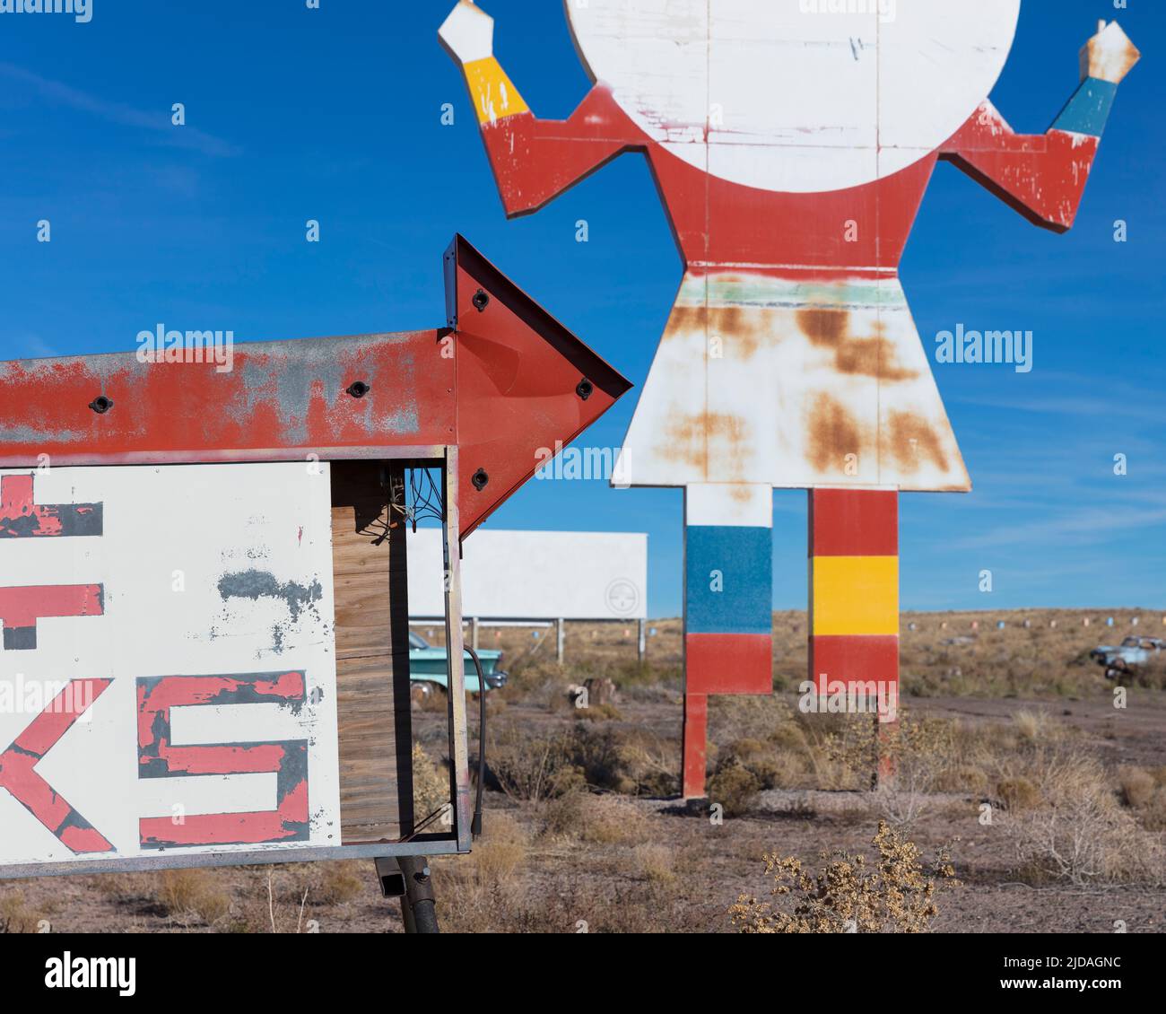 Old roadside attraction sign, a figure of a person with a plate for a head, cafe sign. Stock Photo