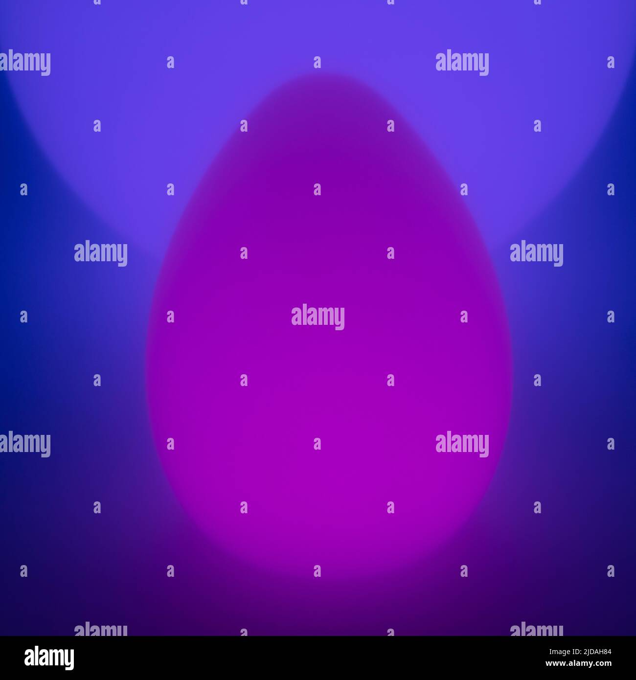 Glowing oval shaped orb, spherical orb in background Stock Photo