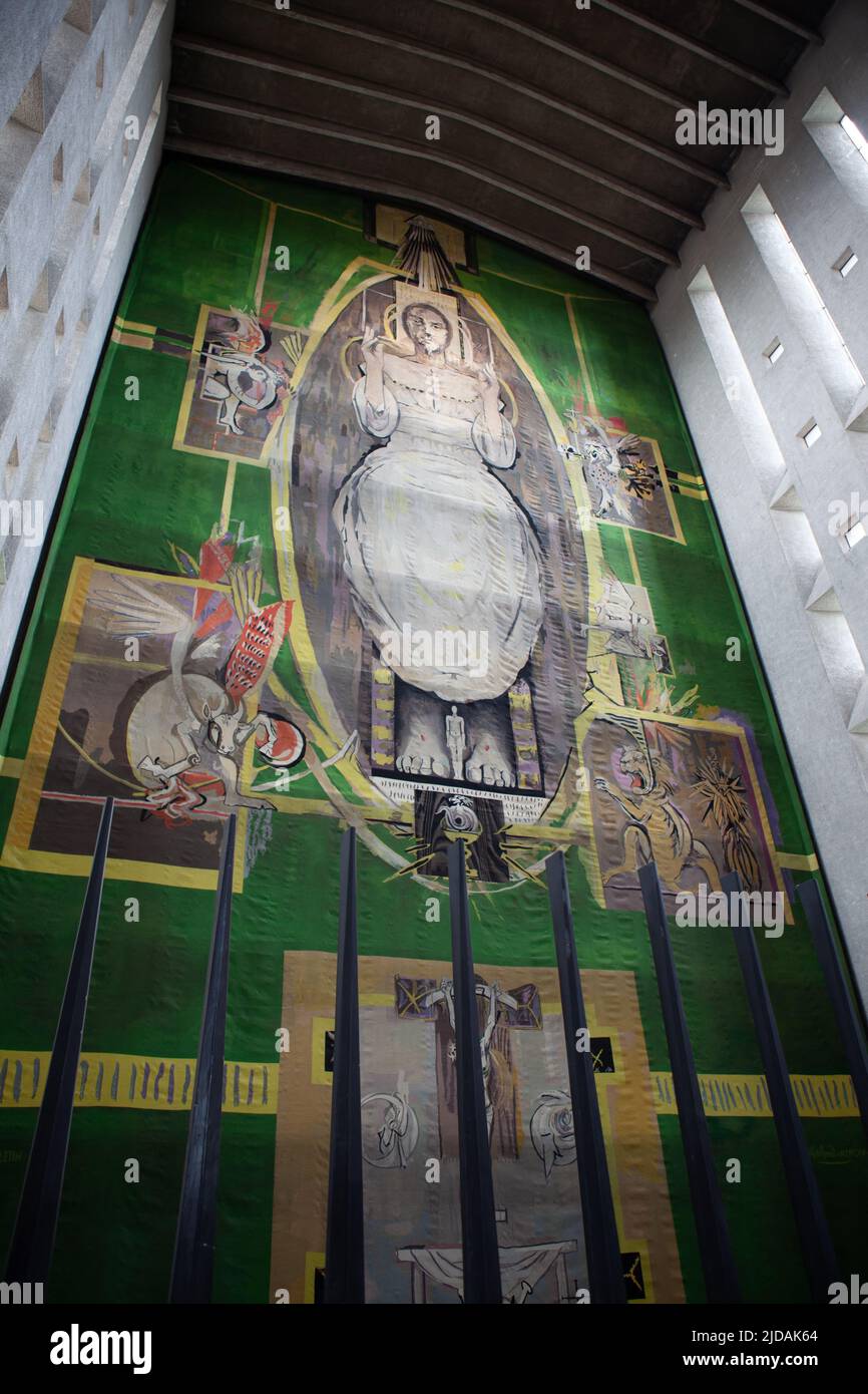 Looking up at Christ in Glory in the Tetramorph, tapestry by Graham Sutherland, in Coventry Cathedral. Stock Photo