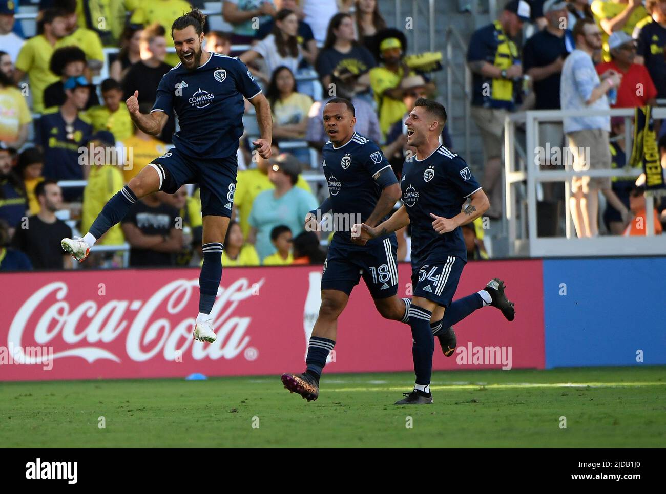 Nashville, USA. June 19, 2022: Sporting Kansas City midfielder Graham Zusi (8) celebrates with his teammates after his goal against the Nashville SC during the second half of an MLS game between Sporting Kansas City and Nashville SC at Geodis Park in Nashville TN Steve Roberts/CSM Credit: Cal Sport Media/Alamy Live News Stock Photo
