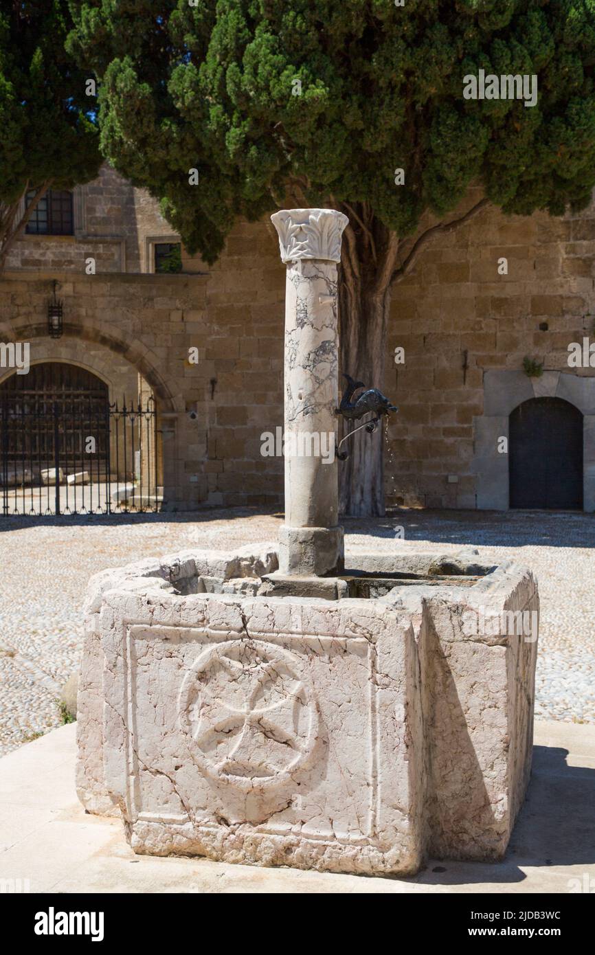 Close-up of the old baptismal fountain in Argyrokastro Square, Rhodes Old Town, Rhodes; Dodecanese Island Group, Greece Stock Photo