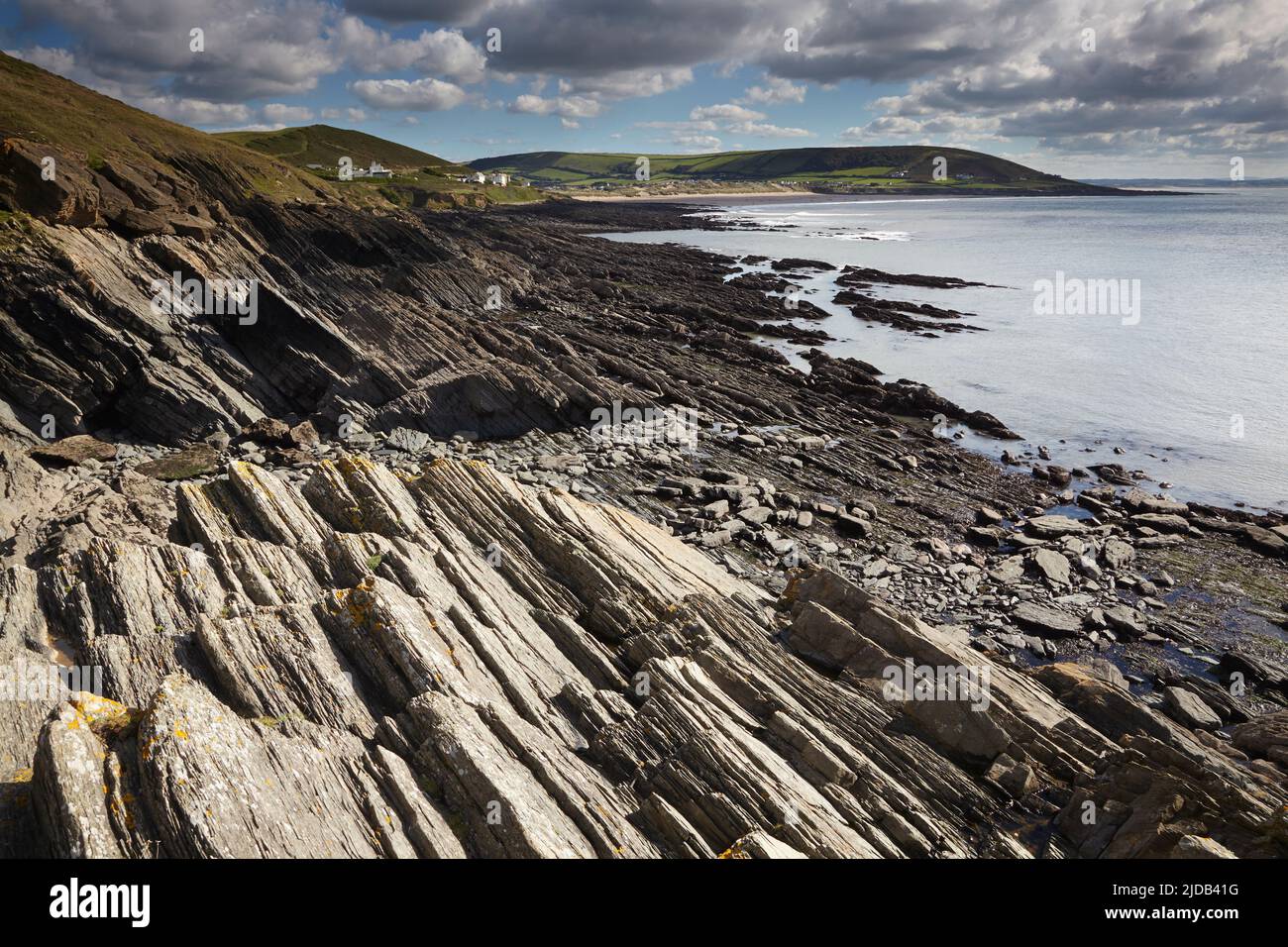 A rocky shoreline on the rugged Atlantic Coast at Baggy Point near Croyde Bay in Devon; Southwest England, Great Britain, United Kingdom Stock Photo