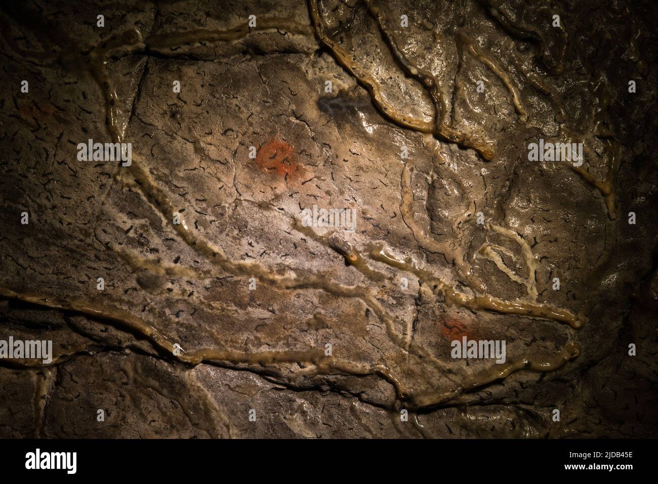 Red patches on the ceiling in the Terminal Hall, Ignatievskaya  cave, Ural Mountains; Russia Stock Photo