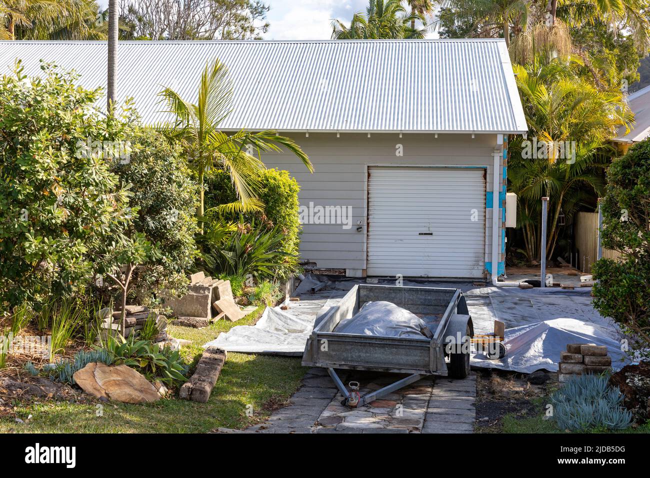 Sydney home in Avalon Beach with new driveway and drive landscaping works being installed,NSW,Australia Stock Photo