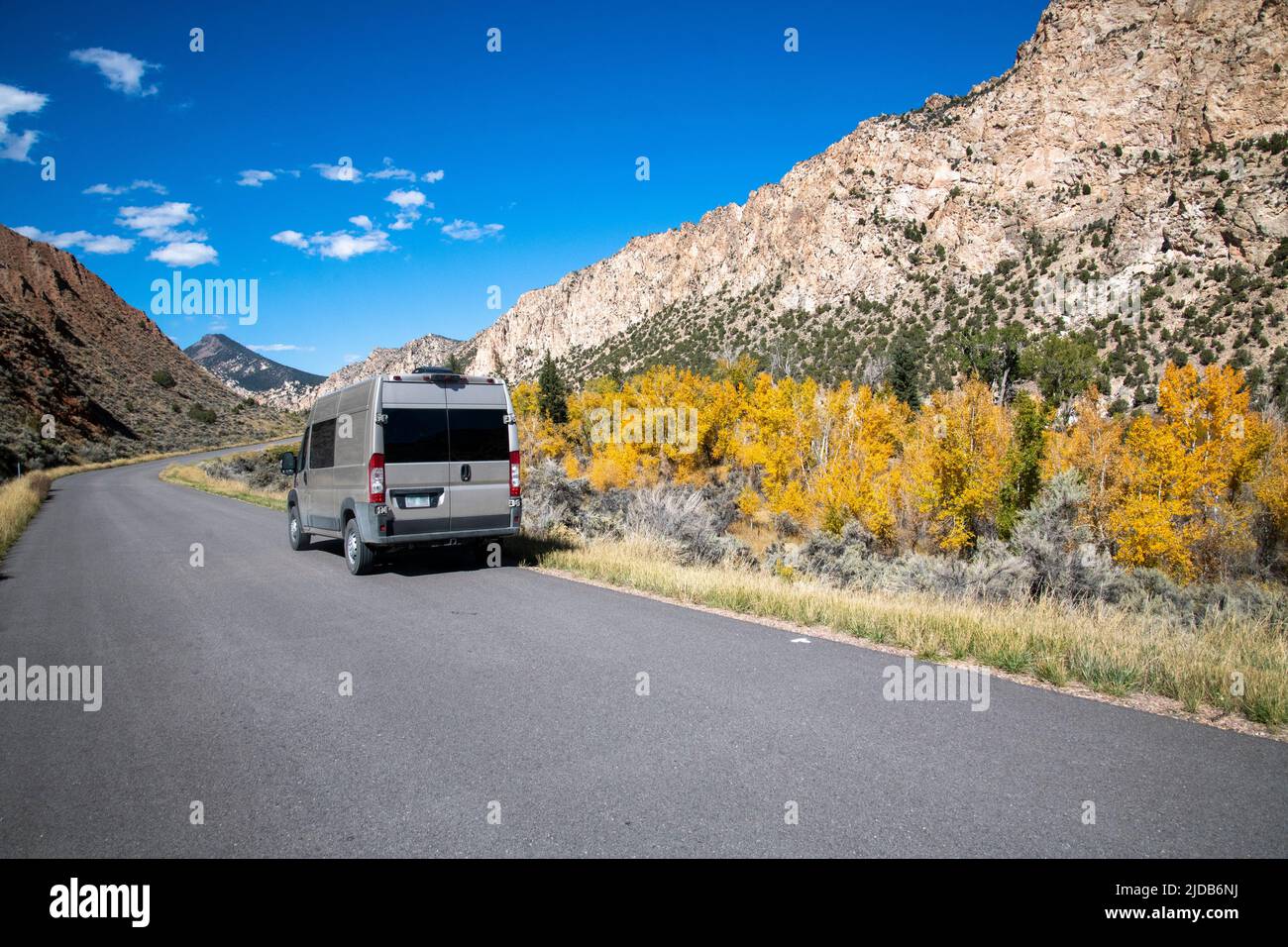 Camper van paused along the Sheep Creek Geological Loop in Ashley National Forest in the Uinta Mountains of Utah. Stock Photo
