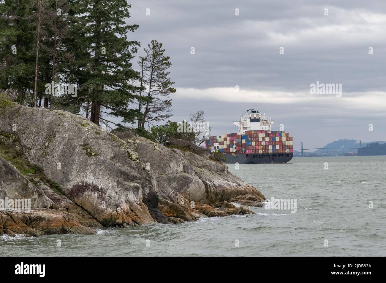 Cargo ship viewed from Lighthouse Park, West Vancouver, BC, Canada