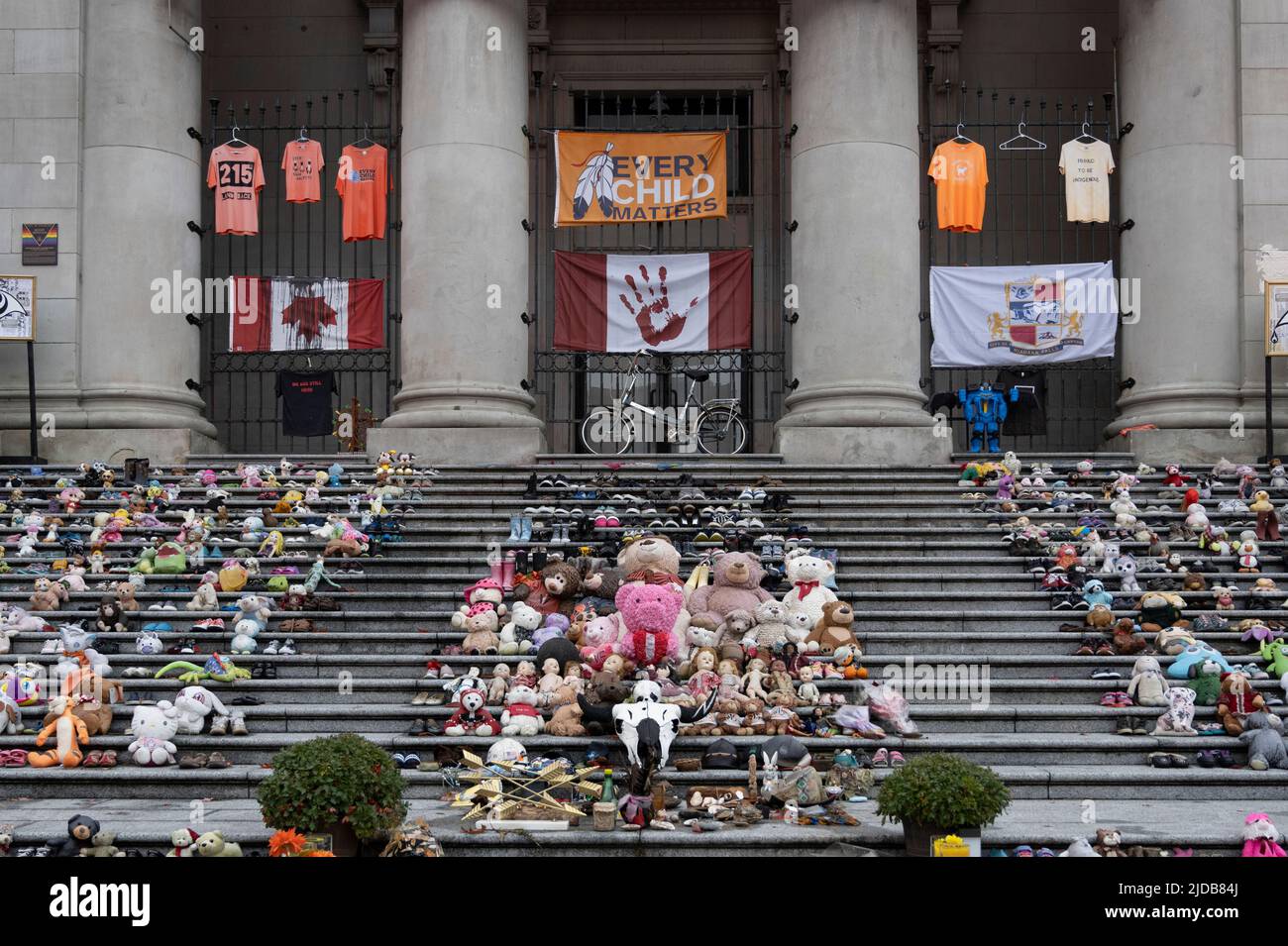 Toys left on the steps of the Vancouver Art Gallery, a part of the 'Every Child Matters' campaign, remembering the lost lives at Canadian Indian Re... Stock Photo