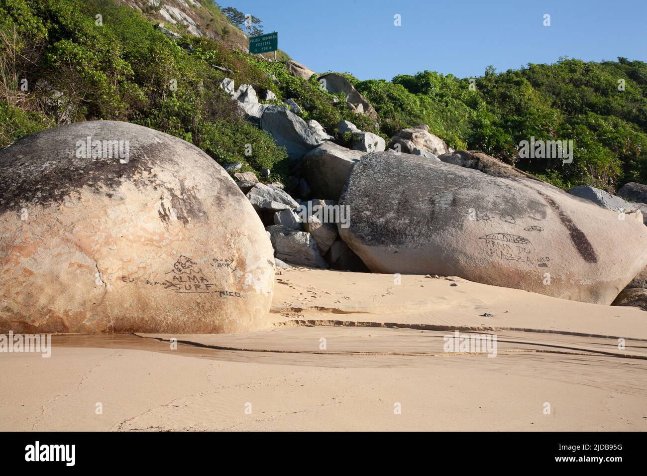 Graffiti on the rocks at Praia da Ilhota (Ilhota Beach) Itapema, Santa Catarina, Brazil Stock Photo