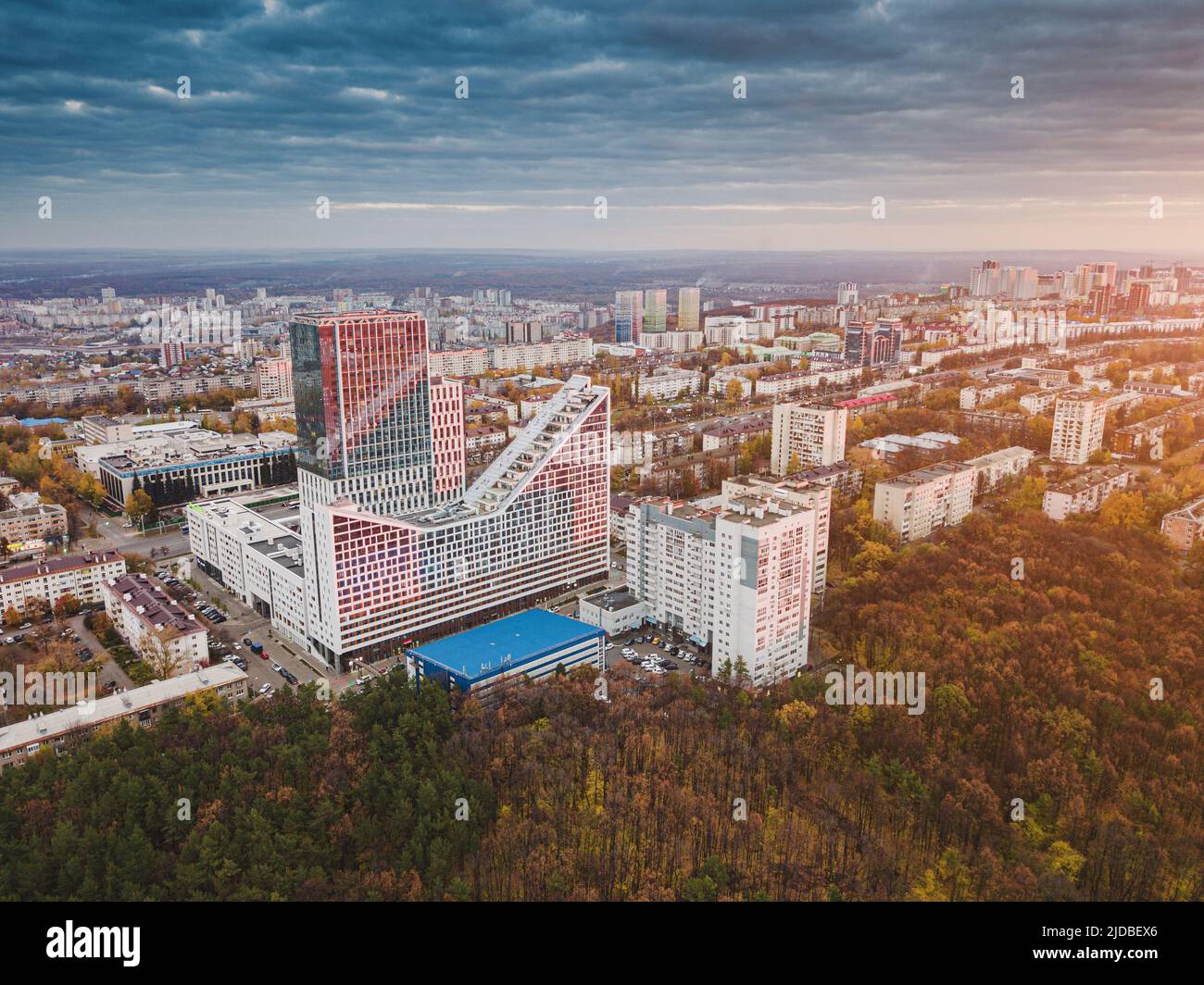 Aerial view of a colourful autumn city park and neighborhood and ...