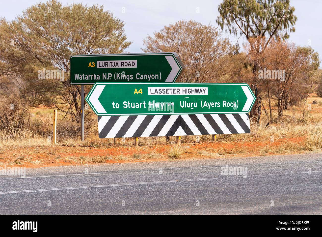 Lasseter Highway and Luritja Road junction Stock Photo