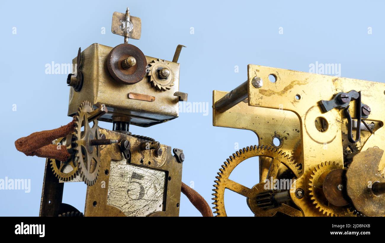 The robot repairs the mechanism. Under construction concept. Stock Photo