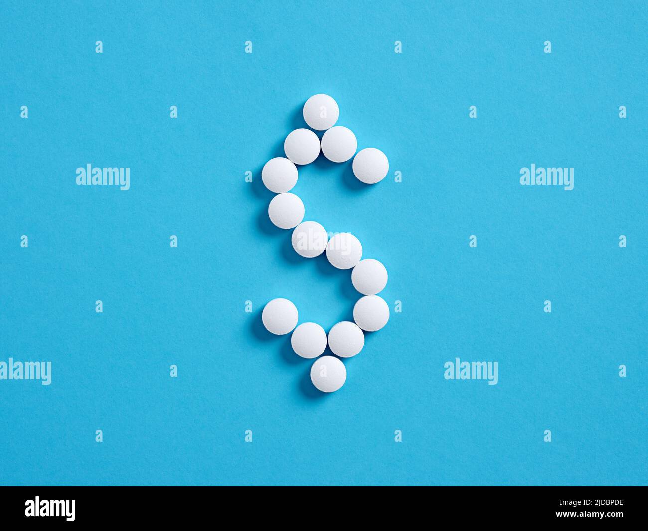 US dollar sign or symbol made with medical pills. Health care medicine expenses concept. Stock Photo