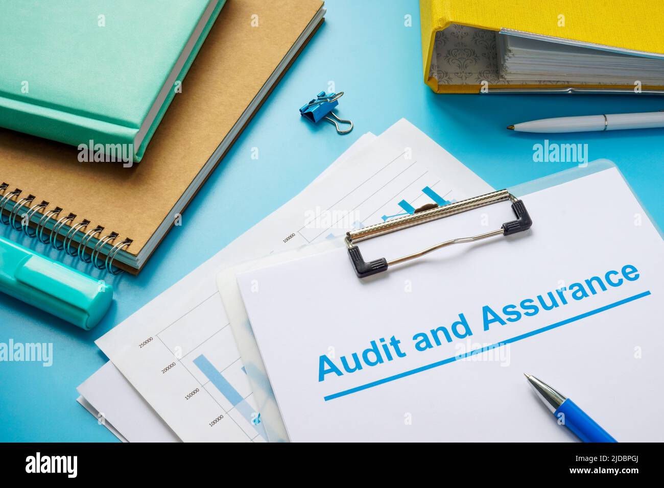 Papers about audit and assurance and folder. Stock Photo