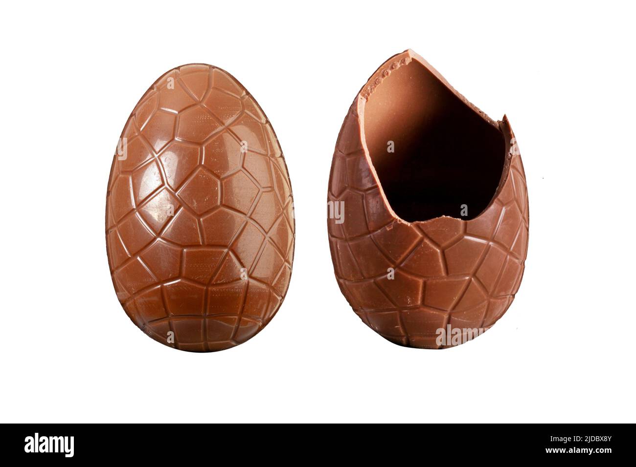 Chocolate Easter egg whole and broken isolated on a white background Stock Photo