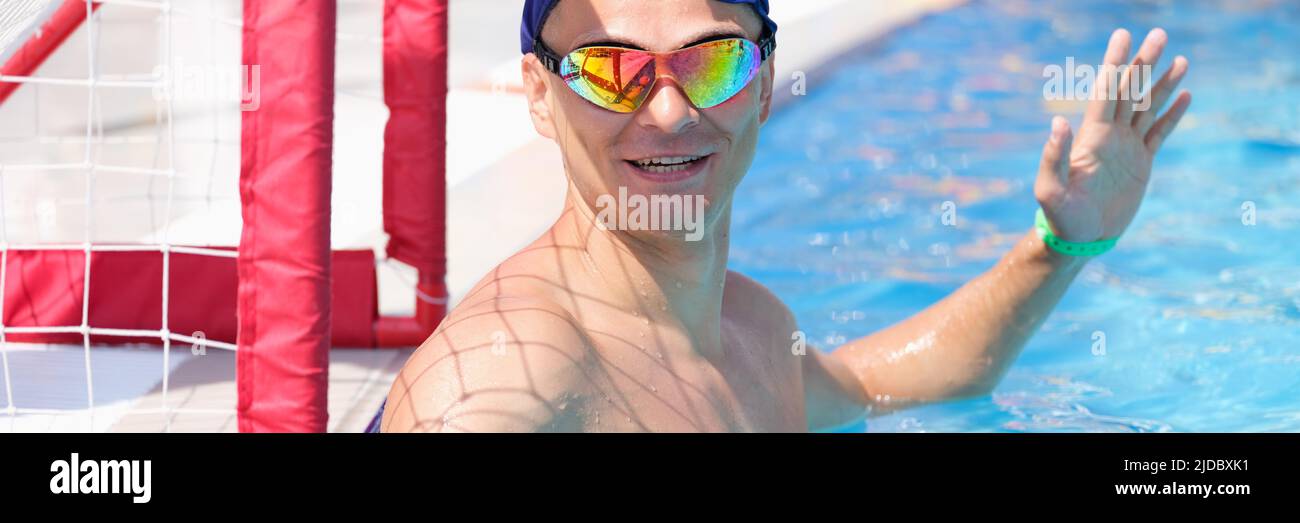 A man goalkeeper plays water polo in the pool Stock Photo Alamy