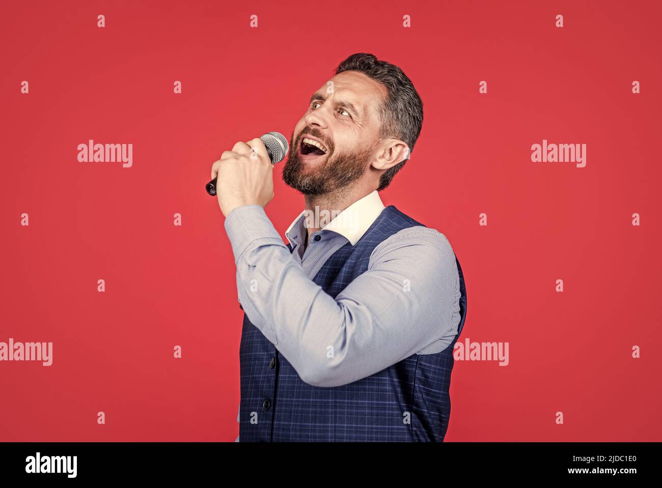 Keep calm and karaoke. Karaoke singer red background. Singing song to ...