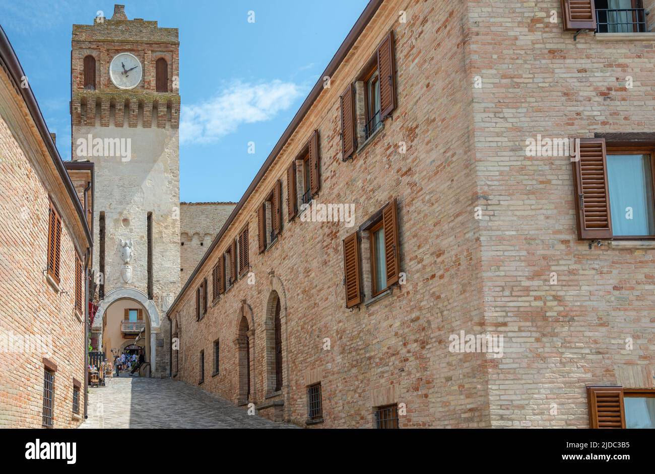 Gradara, Italy - May 29, 2018: View of the Firau tower with clock, ancient entrance to the medieval village Stock Photo