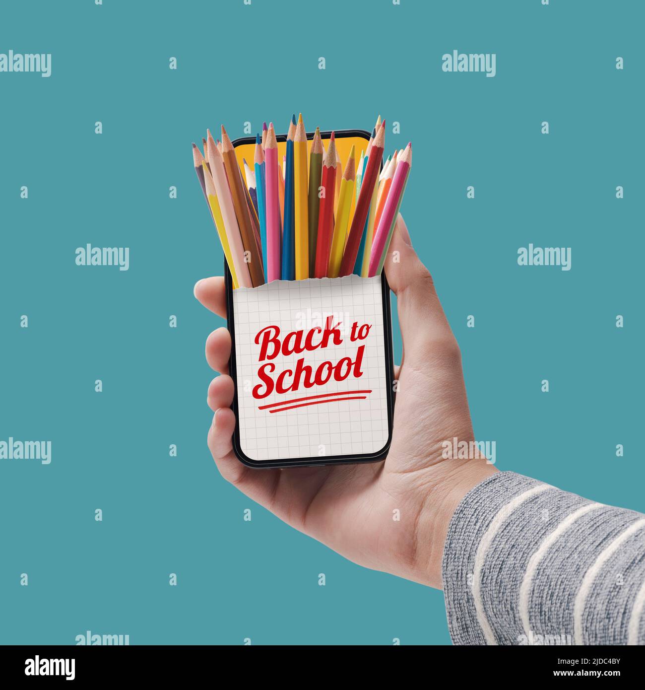 Colored pencils on smartphone, back to school and creativity concept ...