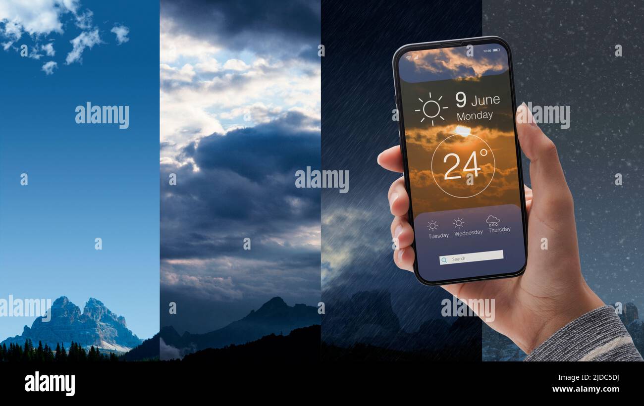 Hand holding a smartphone with weather forecast app on the display