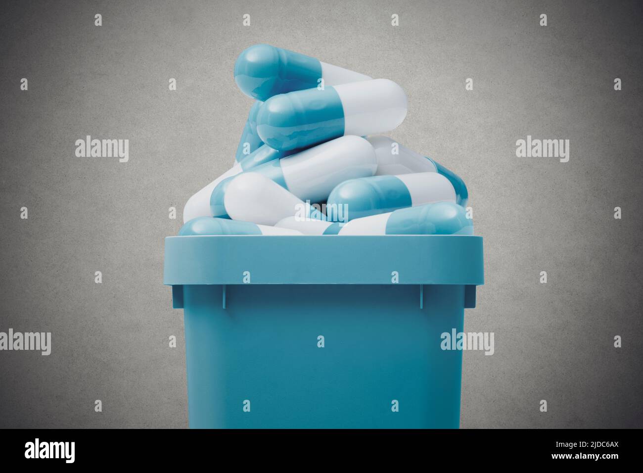 https://c8.alamy.com/comp/2JDC6AX/trash-can-full-of-expired-pills-medical-waste-disposal-concept-2JDC6AX.jpg