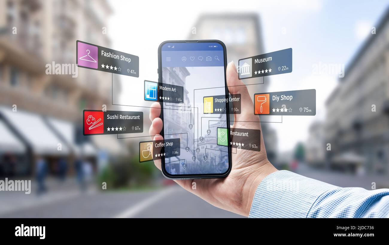 Tourist exploring a city using an augmented reality app on smartphone ...