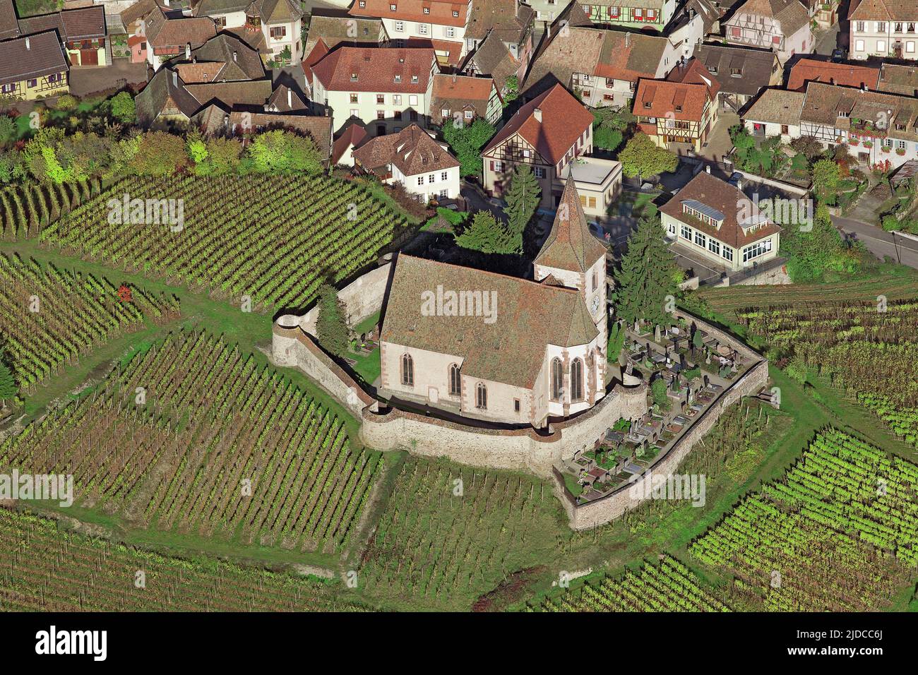 France, Haut-Rhin, Hunawihr, the village, the fortified church (aerial view) Stock Photo