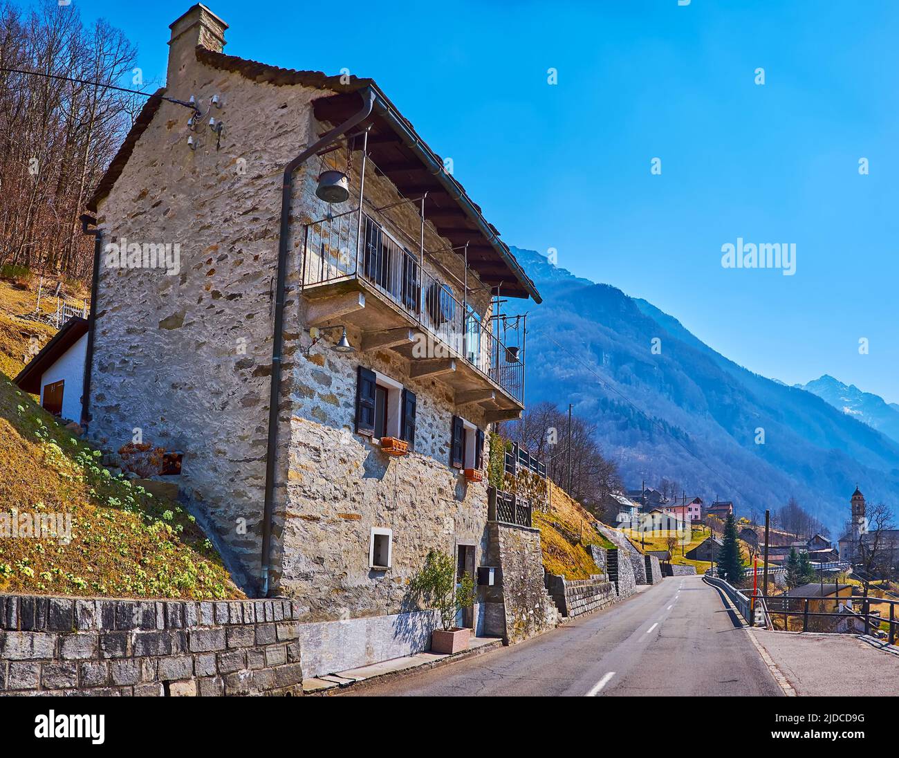 The intercity road runs through the village of Frasco, located in Valle Verzasca, Switzerland Stock Photo