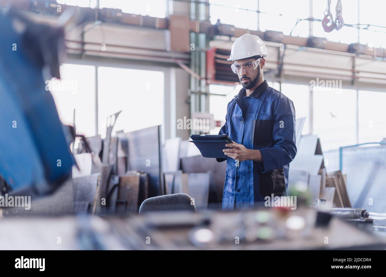 Engineering manager doing routine check up in industrial factory Stock Photo Alamy