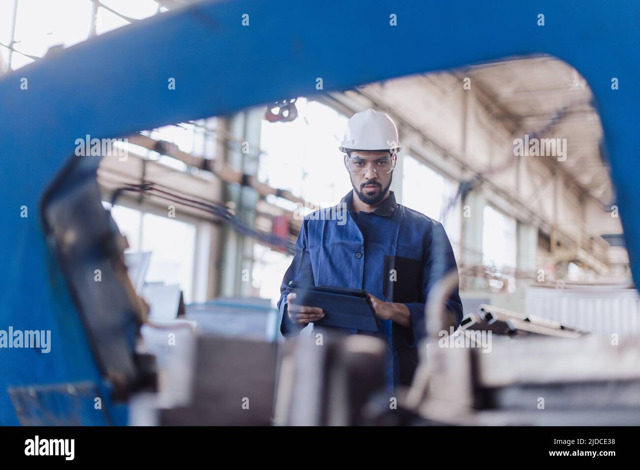 Engineering manager doing routine check up in industrial factory Stock Photo Alamy