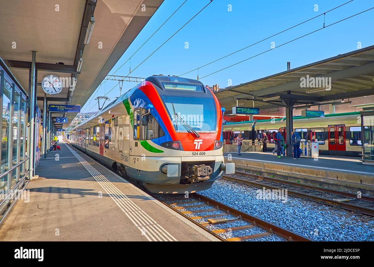 LUGANO, SWITZERLAND - MARCH 27, 2022: The TILO train arrives to the platform of Lugano Railway Station, on March 27 in Lugano Stock Photo